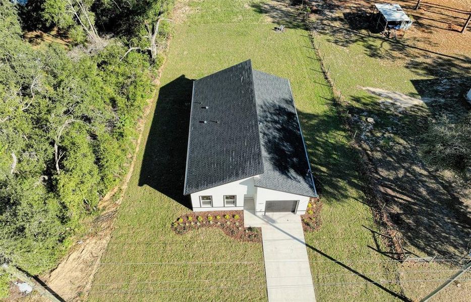 Front exterior of a new home in , Dunnellon, FL, highlighting curb appeal (Image 28).