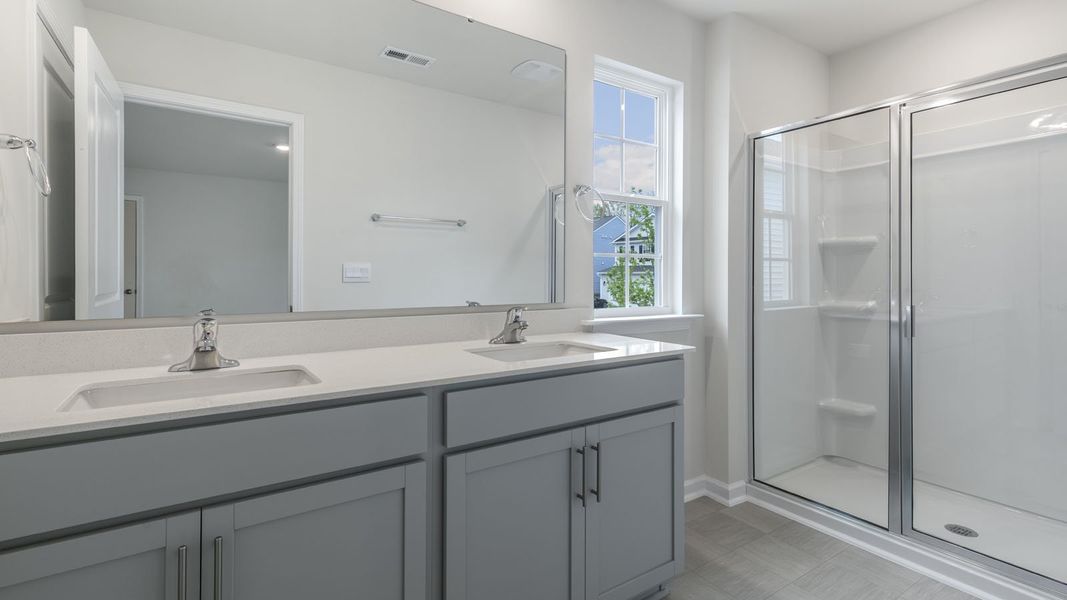 Furnished interior view inside a new home in The Grove at Matthews Landing, Fuquay Varina (Image 9).