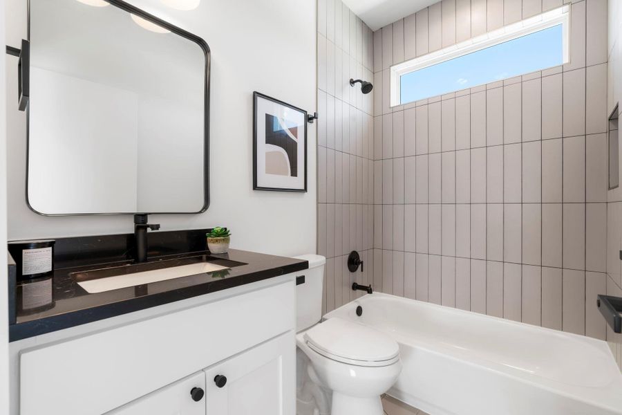 Full bathroom featuring  shower combination and vanity