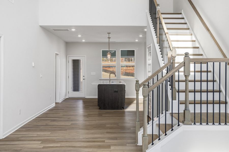 Spacious, unfurnished interior of a new home in Ovation at Sweetbrier, Durham (Image 17).