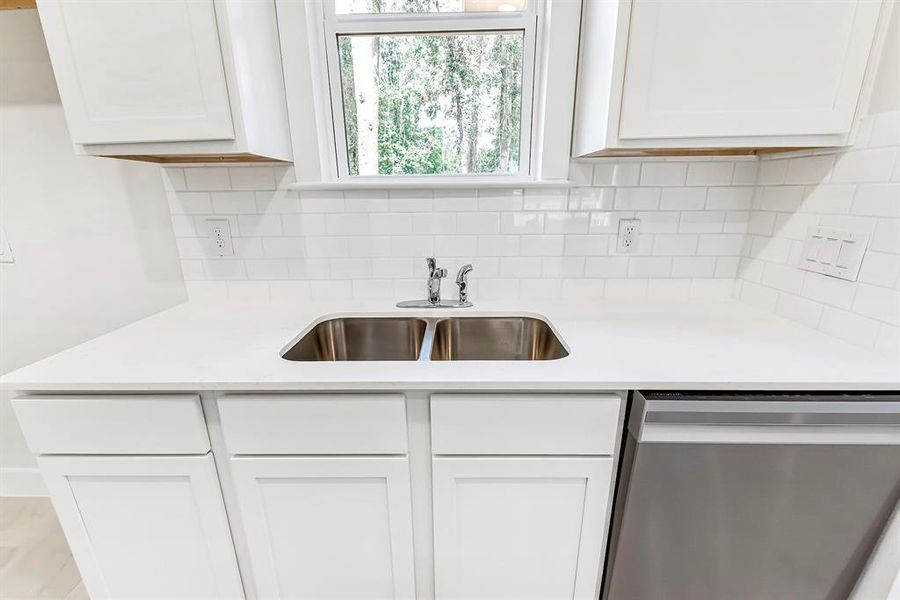 Imagine washing your dishes while looking out to your wonderful backyard view.