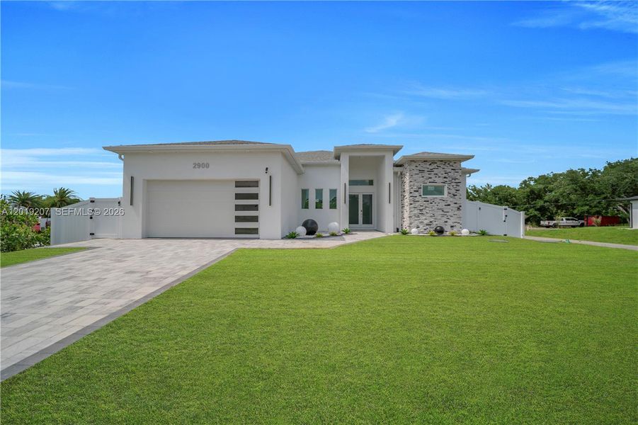 Exterior details and patio area of a home in , Lehigh Acres (Image 3). Exterior details and patio area of a home in , Lehigh Acres (Image 3).