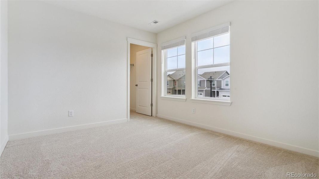 Spacious, unfurnished interior of a new home in Silver Peaks, Lochbuie (Image 14).