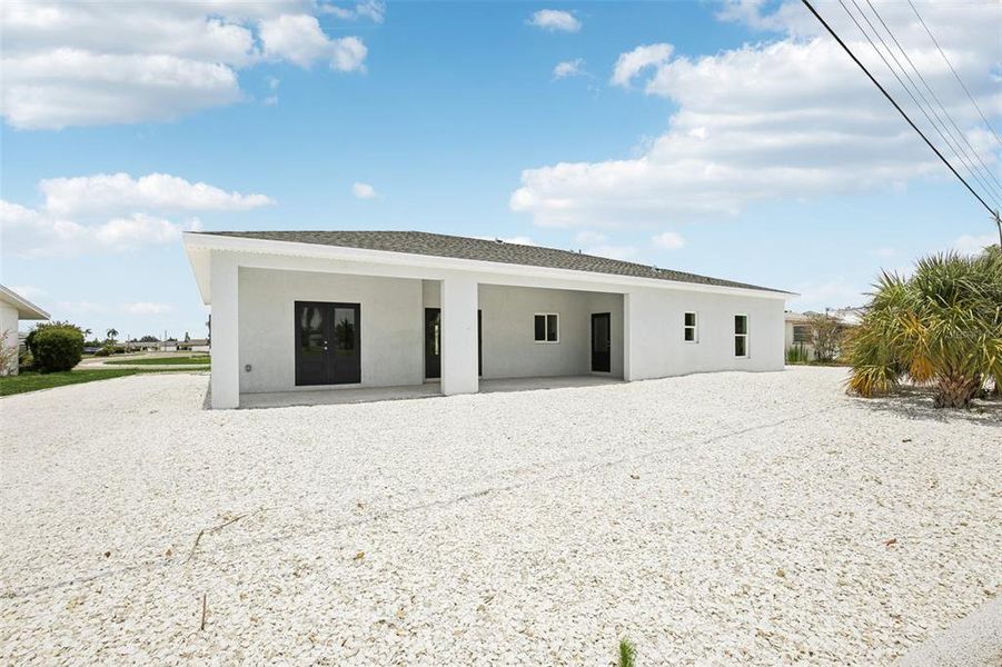 Front exterior of a new home in , Sun City Center, FL, highlighting curb appeal (Image 2).