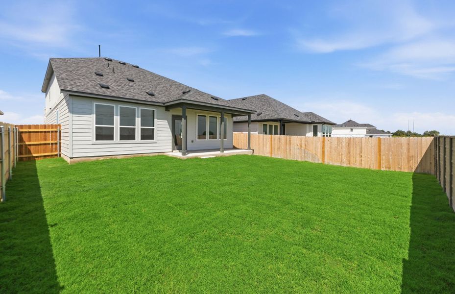 Exterior details and patio area of a home in Kuempel Farms, Pflugerville (Image 24).