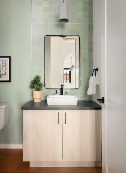 Powder bath on 1st level for guests. Powder bath on 1st level for guests.