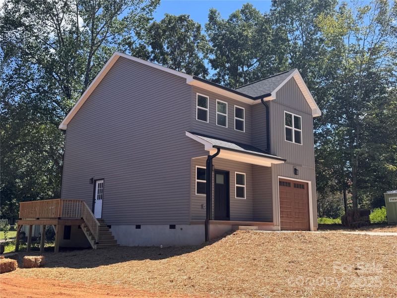 Front exterior of a new home in , Hickory, NC, highlighting curb appeal (Image 19).