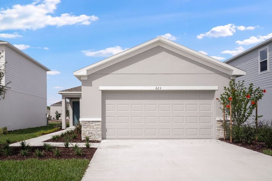 Representative exterior photo of a completed home built from the Holly by Taylor Morrison in Scenic Terrace, Lake Hamilton, FL (Image 1). Representative exterior photo of a completed home built from the Holly by Taylor Morrison in Scenic Terrace, Lake Hamilton, FL (Image 1).