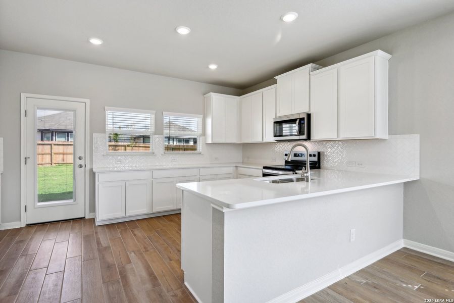 Furnished interior view inside a new home in Kallison Ranch, San Antonio (Image 4).