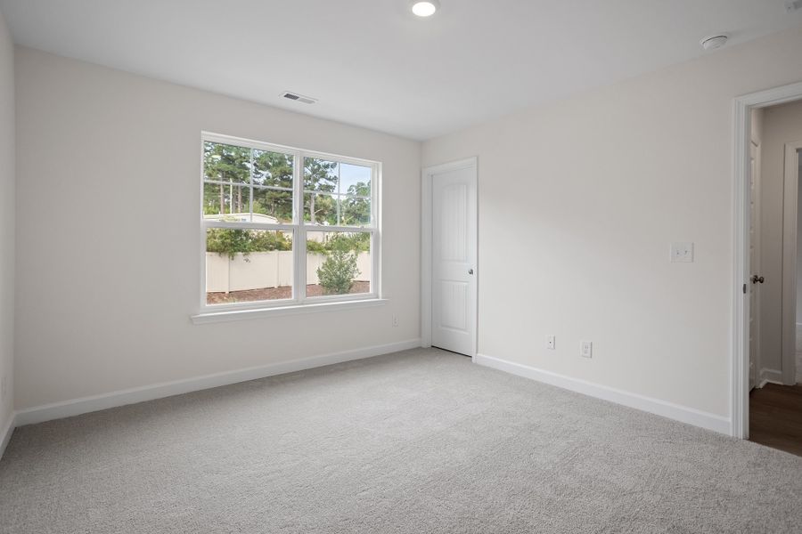 Spacious, unfurnished interior of a new home in Georgias Landing, Raleigh (Image 31).