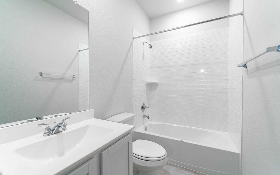 The Guest Bathroom has tub and shower combination and more.