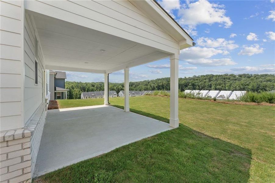 Exterior details and patio area of a home in The Estates at Gainesville Township, Gainesville (Image 3).