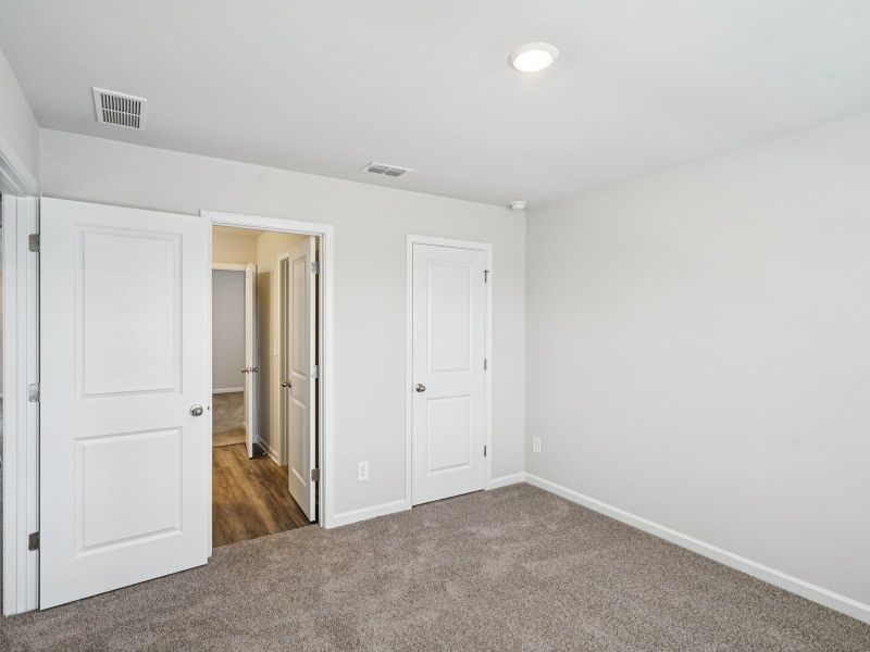 Secondary Bedroom in the Thompson floorplan at a Meritage Homes community in Atlanta, GA.