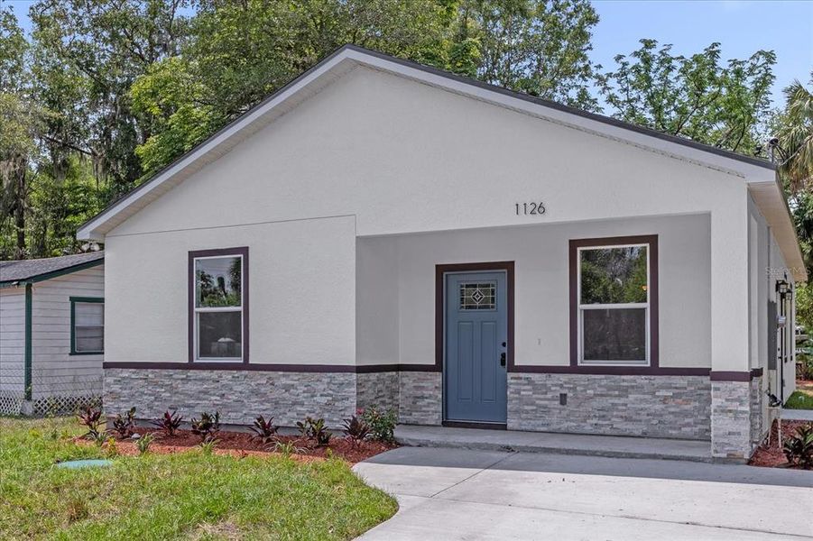 Front exterior of a new home in , Deland, FL, highlighting curb appeal (Image 19).
