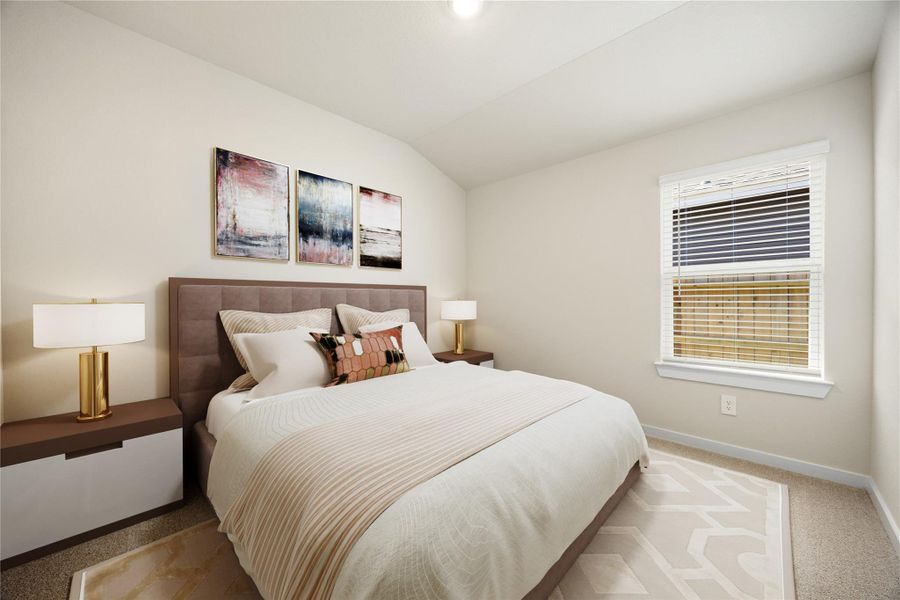 A serene retreat with plush carpet, warm tones, and plenty of natural light, this bedroom is designed for comfort and flexibility.