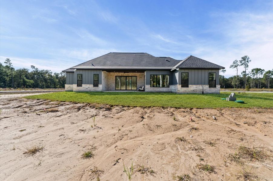 Exterior details and patio area of a home in , Conroe (Image 29).