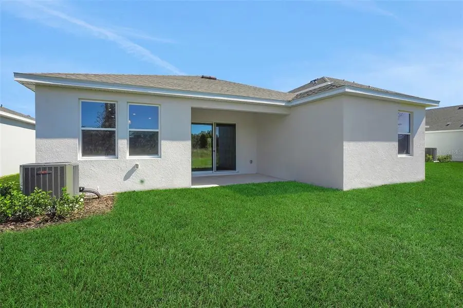 Exterior details and patio area of a home in Willowbrook North, Winter Haven (Image 4).