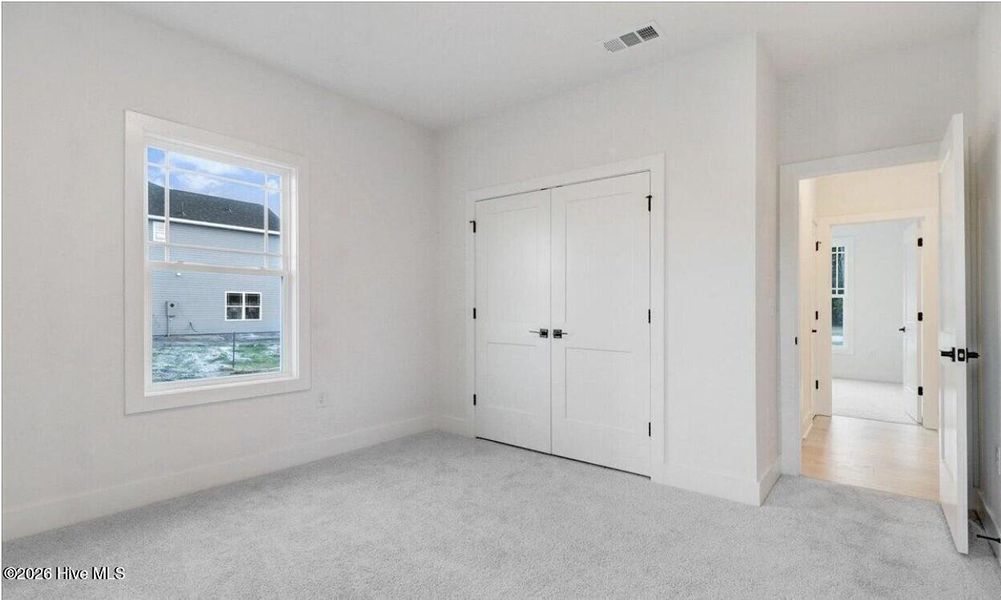 Spacious, unfurnished interior of a new home in Wood Creek Landing, Leland (Image 10).