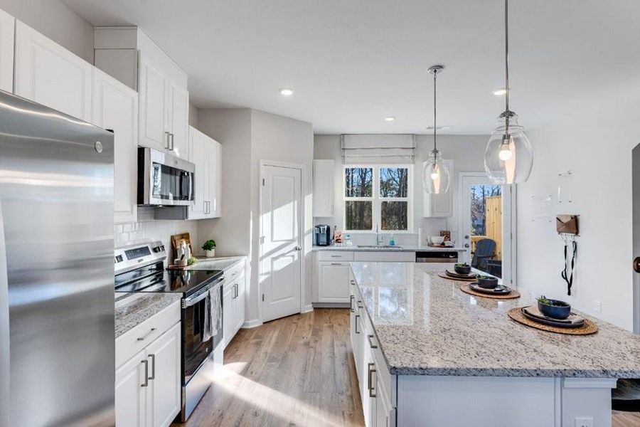 Furnished interior view inside a new home in Somerset at Veterans Memorial, Mableton (Image 9).