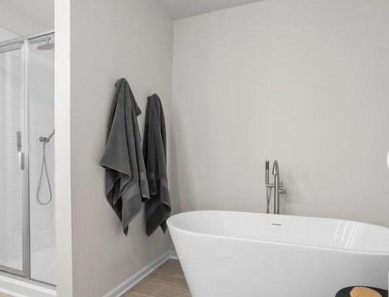 Furnished interior view inside a new home in The Enclave Townhomes, Hampton (Image 8).