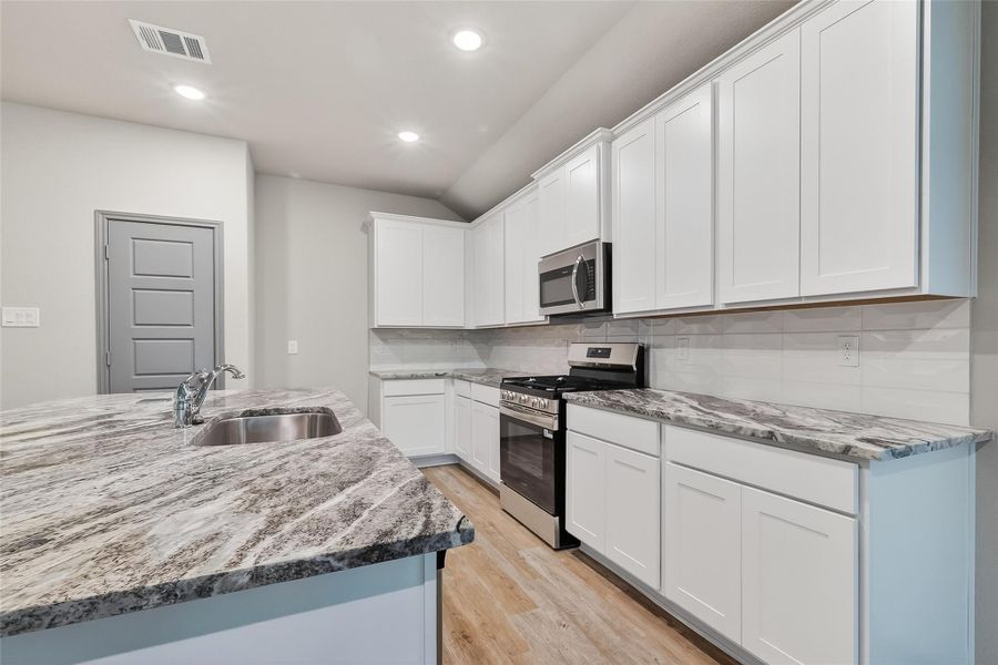 Furnished interior view inside a new home in Rollingbrook Estates, Baytown (Image 12). Furnished interior view inside a new home in Rollingbrook Estates, Baytown (Image 12).