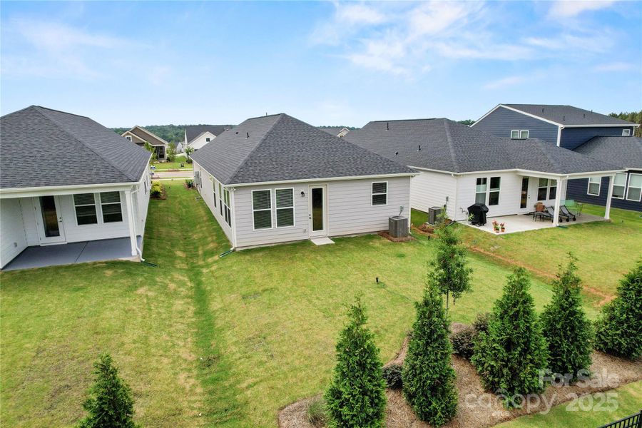Deep and flat backyard, featuring a rear-yard landscaping package for added privacy
