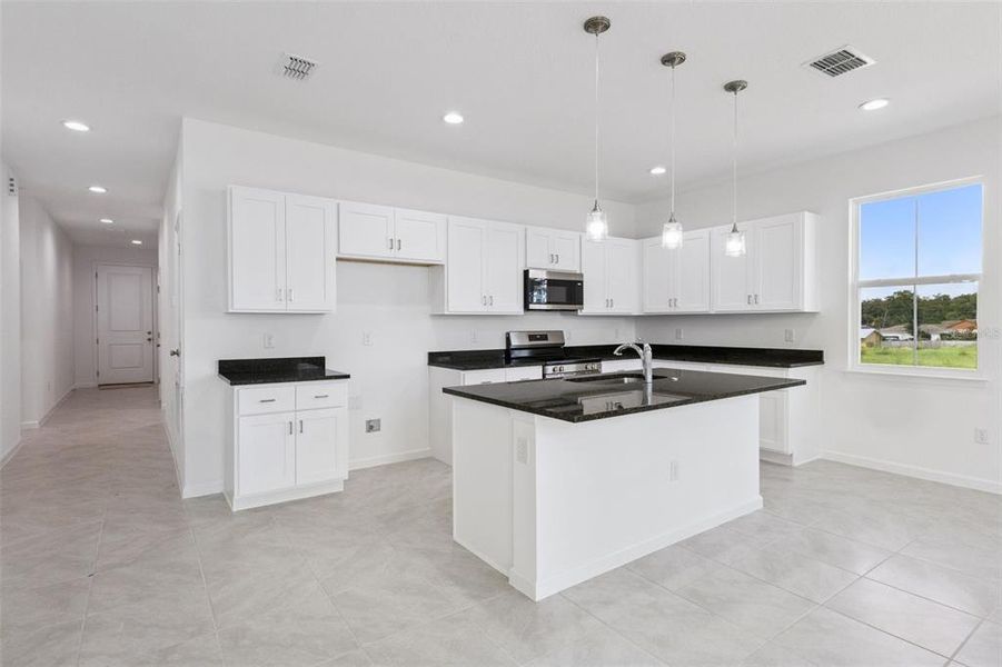 Furnished interior view inside a new home in Grand Isle, Grand Island (Image 9).