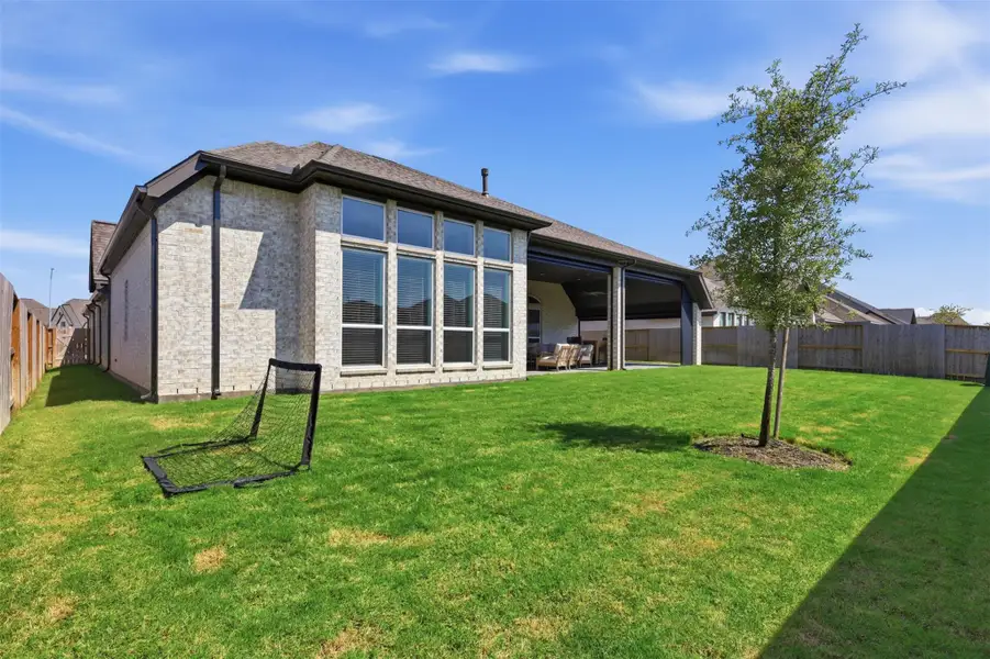 Exterior details and patio area of a home in , Manvel (Image 4). Exterior details and patio area of a home in , Manvel (Image 4).