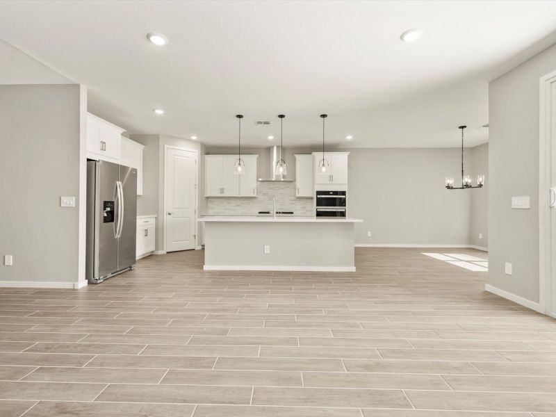 Spacious, unfurnished interior of a new home in Blossom Rock Reserve Series, Apache Junction (Image 7).