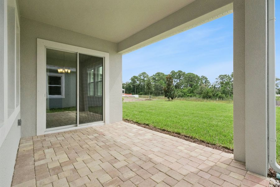 Exterior details and patio area of a home in Northlake at Ovation, Winter Garden (Image 20).