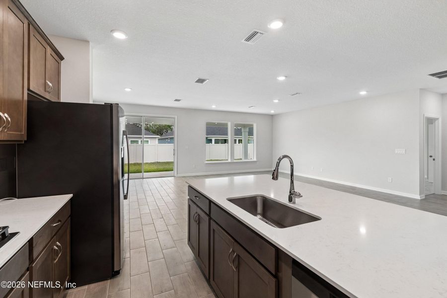 Furnished interior view inside a new home in Tributary 50', Yulee (Image 10).