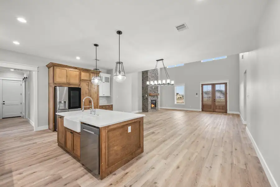 Furnished interior view inside a new home in , New Waverly (Image 13).
