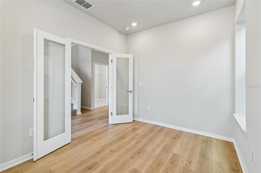 Spacious, unfurnished interior of a new home in Laureate Park at Lake Nona - Garden Series, Orlando (Image 17).