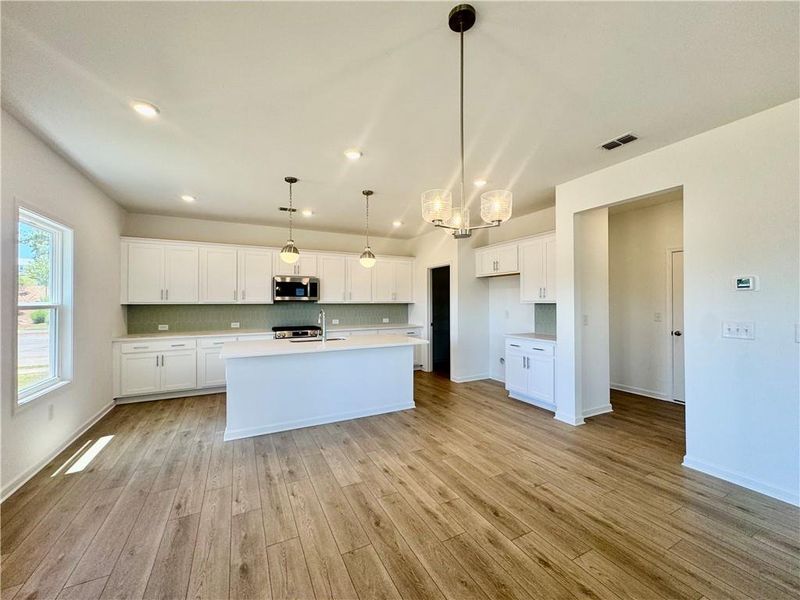 Spacious, unfurnished interior of a new home in Eastlyn Crossing, Flowery Branch (Image 13).