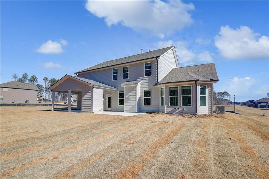 Exterior details and patio area of a home in Riverbend Overlook, Fayetteville (Image 20).