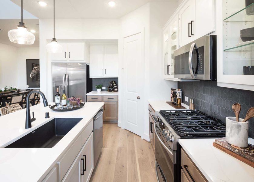 Representative furnished interior of a home built from the Chester Plan by Highland Homes in Bridgeland Central: The Cottages, Cypress (Image 7).