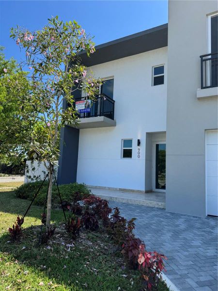 Front exterior of a new home in , Miami, FL, highlighting curb appeal (Image 15). Front exterior of a new home in , Miami, FL, highlighting curb appeal (Image 15).