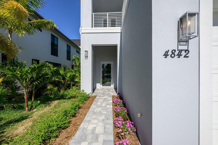 Front exterior of a new home in , Vero Beach, FL, highlighting curb appeal (Image 1).