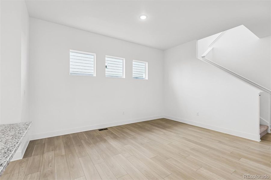 Spacious, unfurnished interior of a new home in Painted Prairie Cottage, Aurora (Image 20).