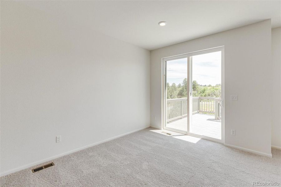 Spacious, unfurnished interior of a new home in Terrain Oak Valley, Castle Rock (Image 19).
