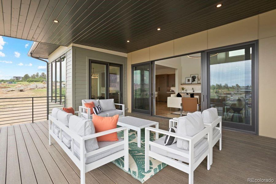 Covered patio with a sleek tongue-and-groove ceiling.