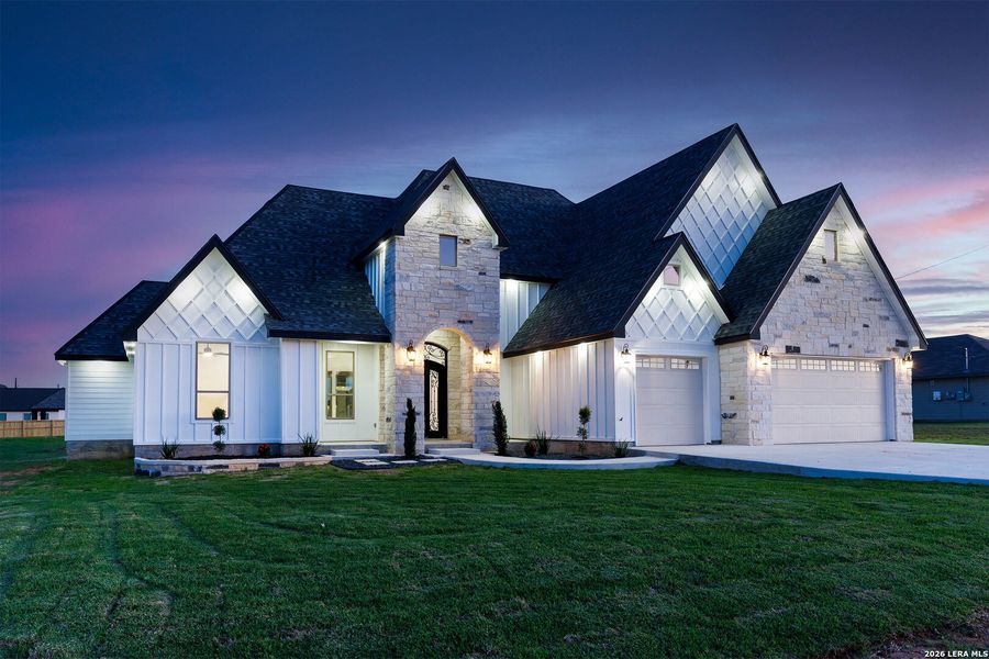 Front exterior of a new home in , Atascosa, TX, highlighting curb appeal (Image 27).