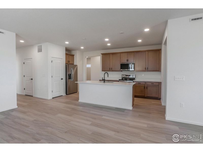 Furnished interior view inside a new home in Bloom Trailblazer Collection - Single Family Homes, Fort Collins (Image 12).