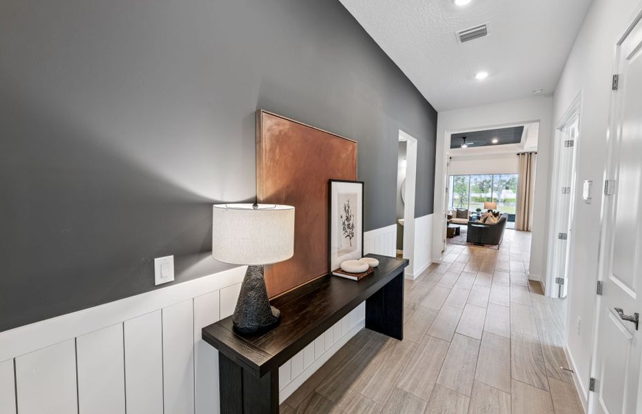 Representative furnished interior of a home built from the Prestige by Del Webb in Explore Verona, Dade City (Image 9).