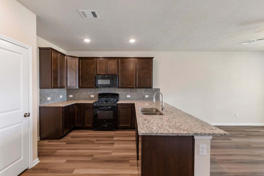 2D floor plan layout for the The 1443 by Stylecraft Builders in Sterling Ridge, Huntsville, TX (Image 8).