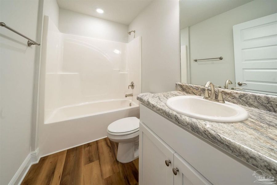 Representative furnished interior of a home built from the Plan 1515 Cottage by Adams Homes in Turtle Creek, Cantonment (Image 7).