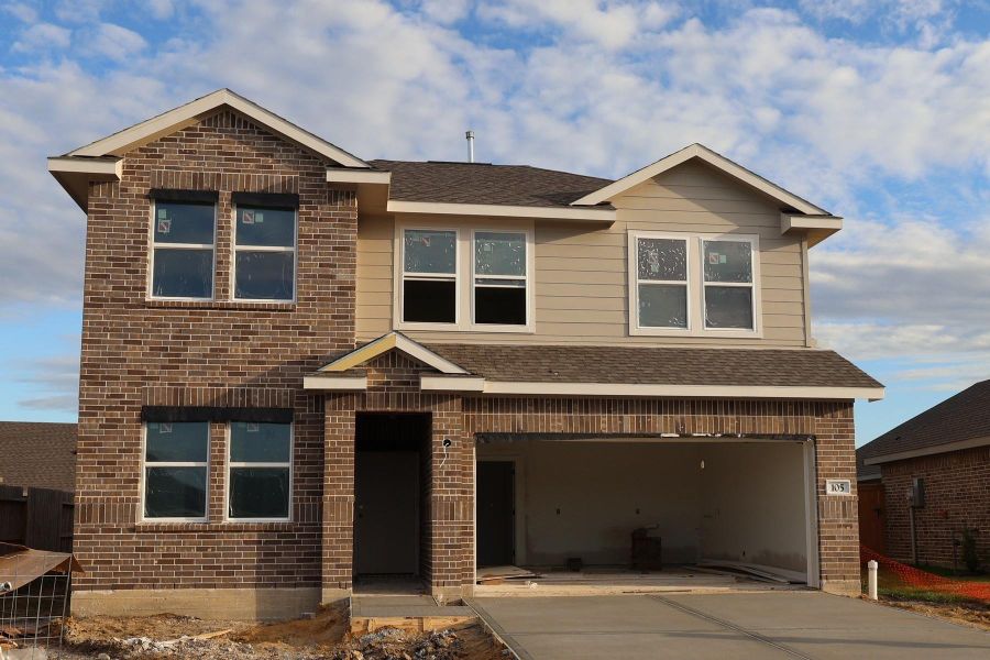 Two story home with 5 beds, 3 baths, and 2 car garage
