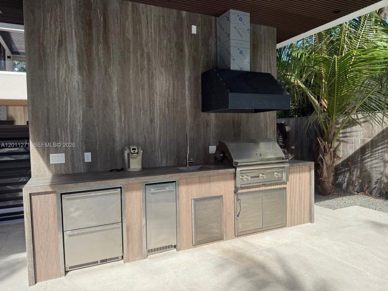 Exterior details and patio area of a home in , Miami (Image 3).