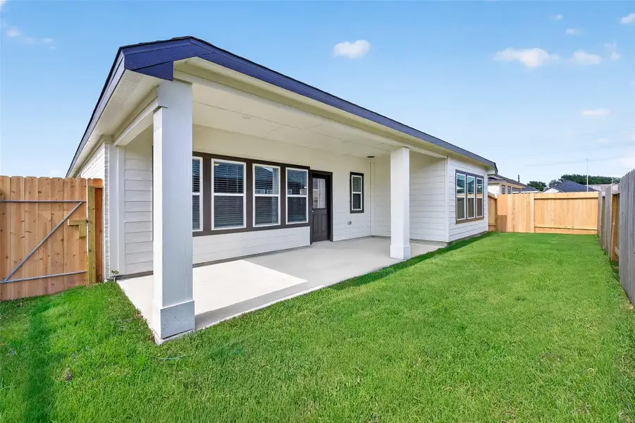 Exterior details and patio area of a home in Rollingbrook Estates, Baytown (Image 4). Exterior details and patio area of a home in Rollingbrook Estates, Baytown (Image 4).