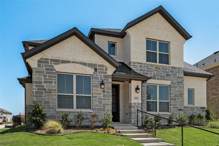 Front exterior of a new home in Villages of Creekwood, Frisco, TX, highlighting curb appeal (Image 2). Front exterior of a new home in Villages of Creekwood, Frisco, TX, highlighting curb appeal (Image 2).